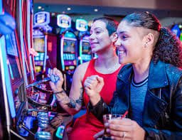 tbjili slot game reels spinning on a mobile device